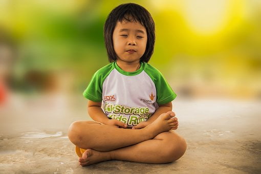 Little Kid Doing  meditation