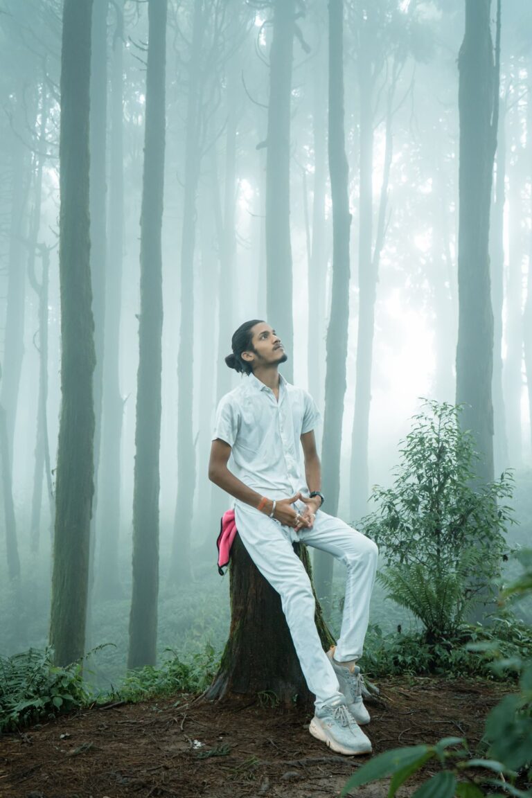 What Is Karma? Meaning, Types and Karma Yoga 1 Person sitting in quiet reflection among trees