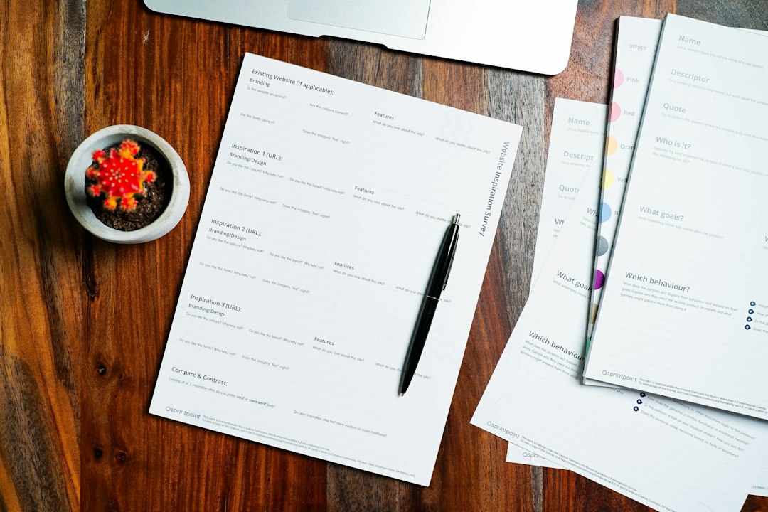 Papers and pen representing terms and conditions