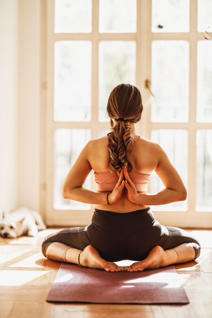 Woman Doing Yoga At Home