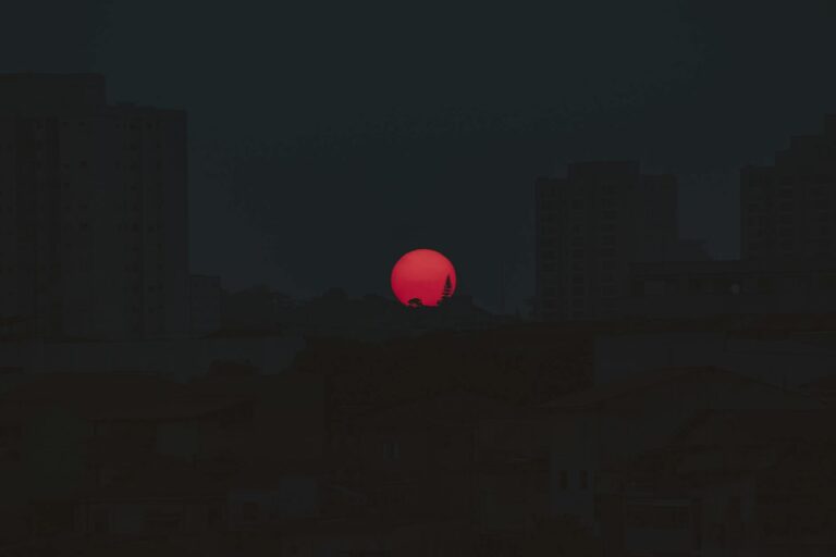 red moon at nightime