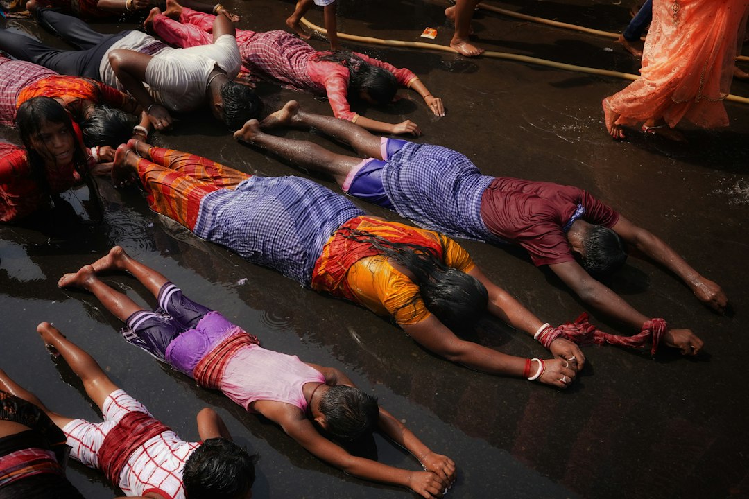 Yoga teacher training students practising together