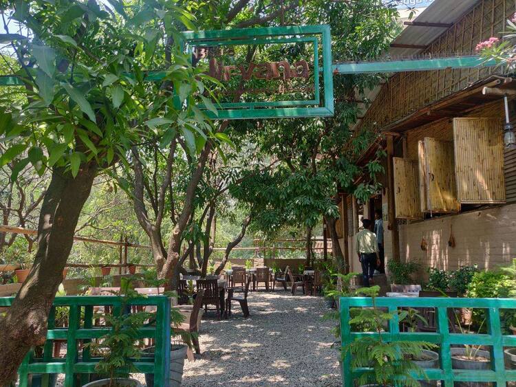 Bistro Nirvana cafe garden seating in Tapovan Rishikesh