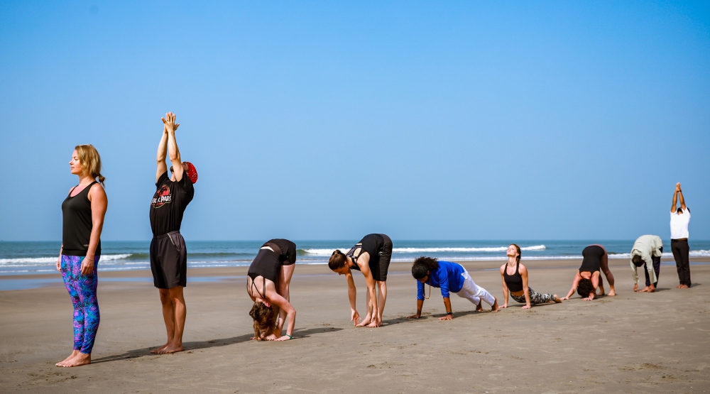 200 Hour Yoga Teacher Training in India–A Life-Changing Journey 2 Students in yoga teacher training practising a guided sequence